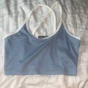 Blue shirt with white straps from SHEIN.